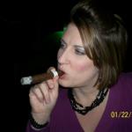 The lovely Jennifer enjoys a el viejo mundo prmium cigar.